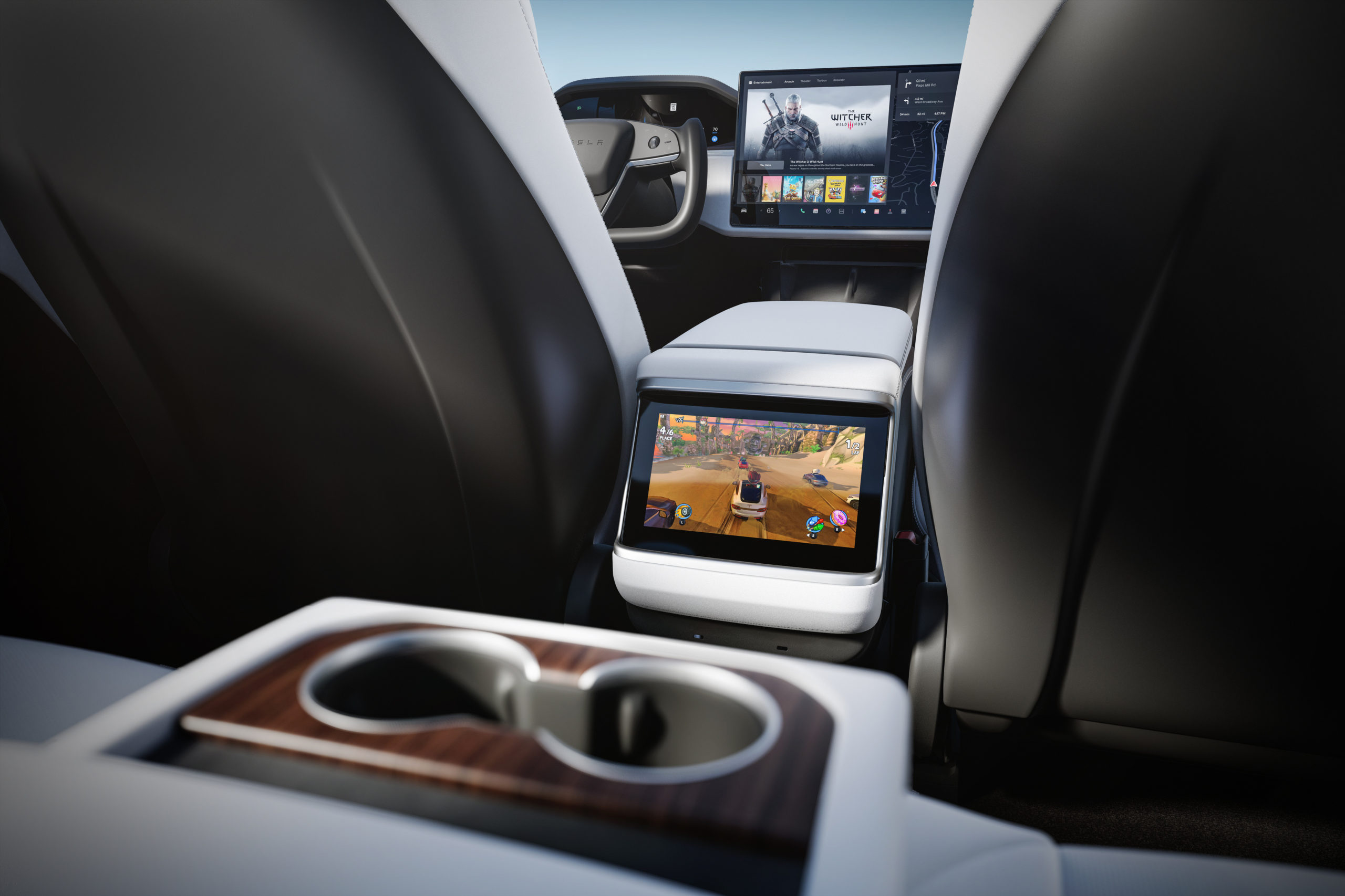 Tesla blocks ‘Passenger Play’ feature while driving