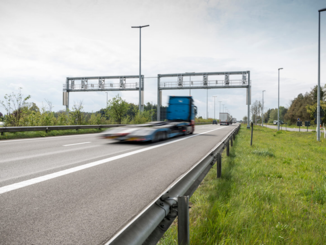 Kilometer charge for trucks offsets greening traffic tax